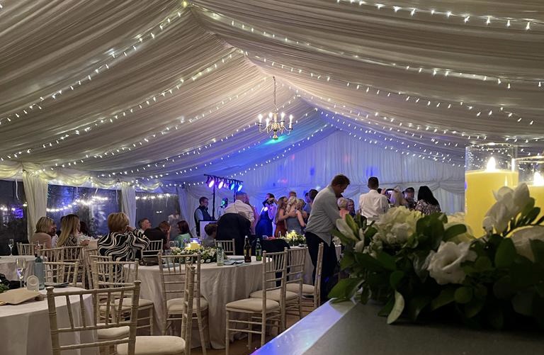 outdoor wedding marquee fairy lights and function tables