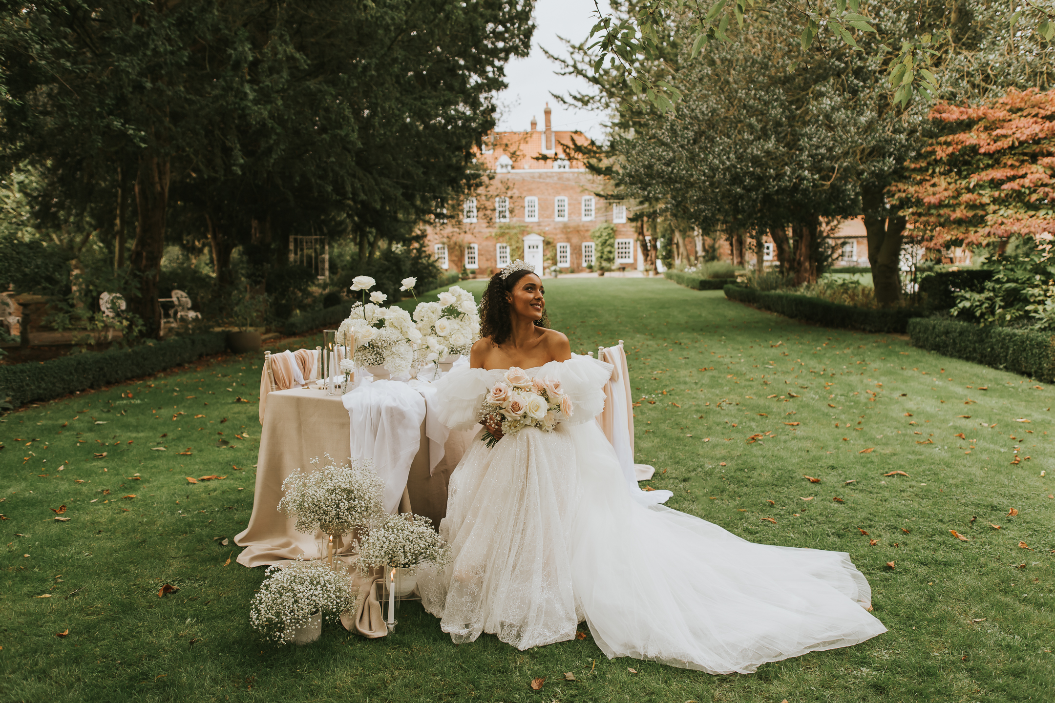 picturesque bride on lawned gardens